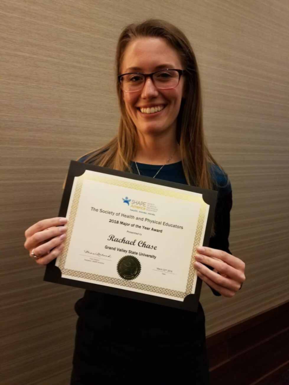 Woman holding an award